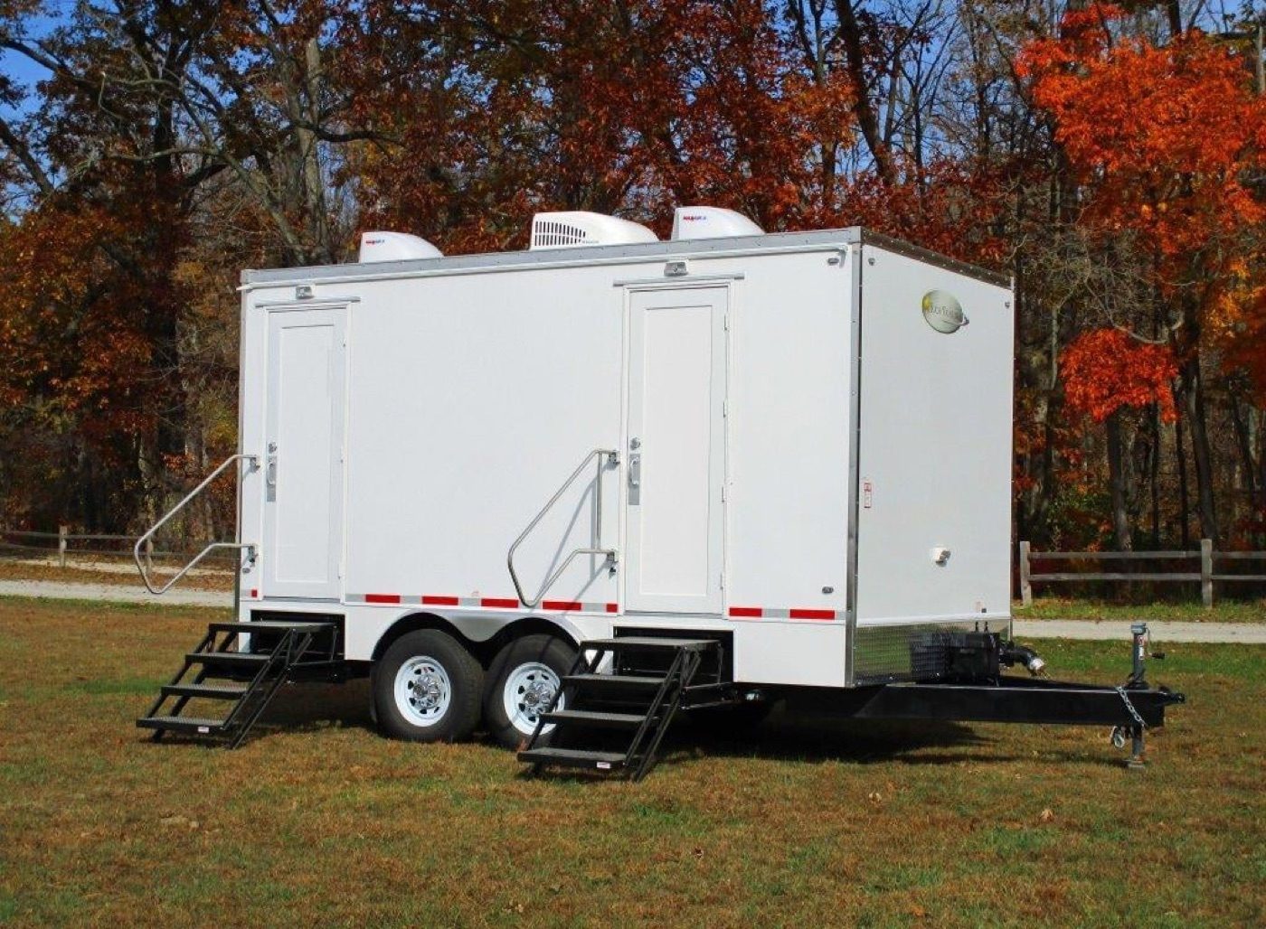 Five station restroom trailer set up for a fall event on Marylands Eastern Shore